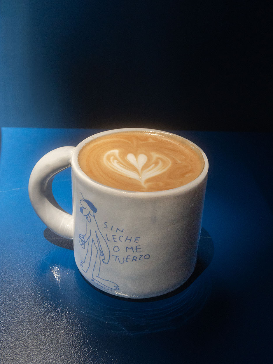 Barista pouring latte art